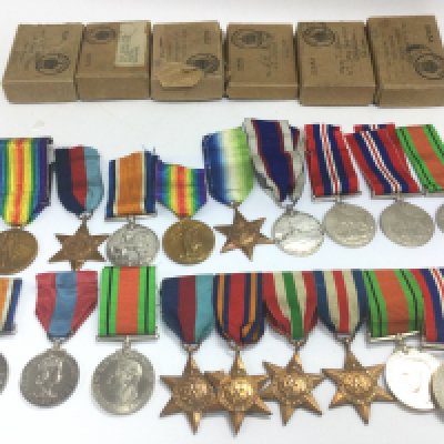 WW1 & 2 British Medals including the Atlantic star, the 1939-45 star, Burma star, Italy star, France and Germany star, Reserve long service and good conduct medal etc. Medals presented to m2-267340 Pte. A.T.C. Osbourne. A.S.C, SS.8539(CH.B.17809)T.W. DAVIES.A.B.R.F.R, Including several boxes. postage category B