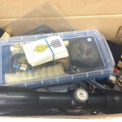 A collection of assorted military items including a rifle scope, various medals including a Territorial force Efficiency medal , 1939-1945 star,France and Germany star, Hong Kong Service medal, liberation of Kuwait medal, shagreen sword grips etc. postage category B