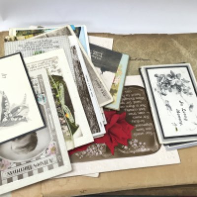 A early 20th century post card album containing various U.K. and world locations. Postage category B