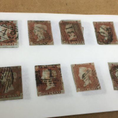 A small booklet containing various Penny Red stamps together with loose sheets of World stamps