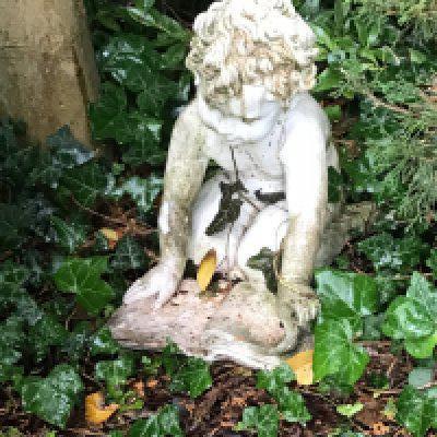 A concrete, composition, garden ornaments in the form of a putti reading a book and a bird bath Hight 73cm sold in situ good condition buyer to collect (2) NO RESERVE