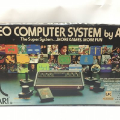 A boxed vintage Atari Video Computer System, Model No CX-2600. This lot cannot be posted