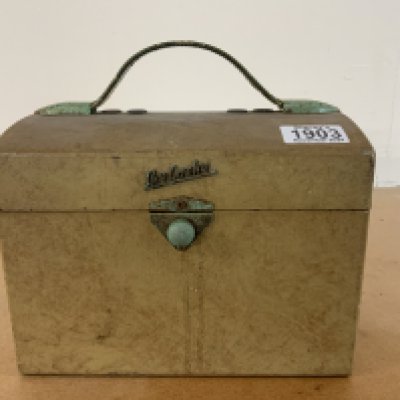 A boxed radio. Postage category C.