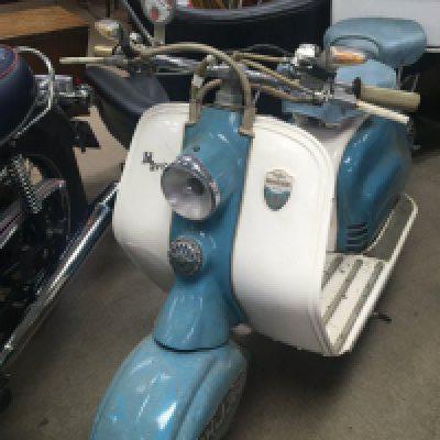 A rare opportunity to Purchase a well maintained and original 1956 Lambretta LDA. Registration NHJ 388. The scoter with double separate seat and finished in original pale blue and white withComes with V5 old and new and historical paperwork including the receipt of purchase by the late owner in 1963. Also included is a certificate from the Vintage Motor Scooter club. Confirming authenticity of originality including details of frame and engine number. In very good condition the only additions being electric start and small indicators and back storage box.