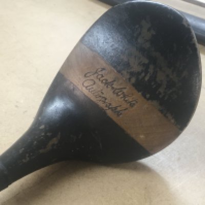 A Jack white golf club.