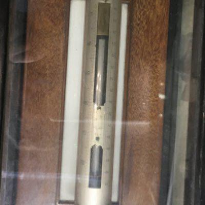 WITHDRAWN - A cased ships stick barometer.
