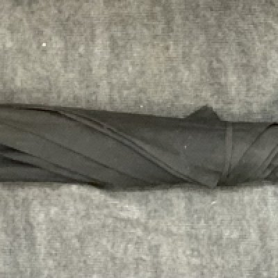 A vintage eastern parasol with white metal parasol (D). NO RESERVE