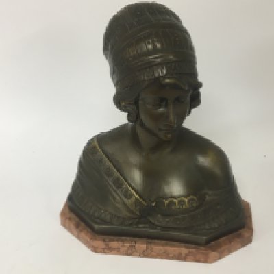 An Art Deco bronze bust of a female on a marble base height 33cm.