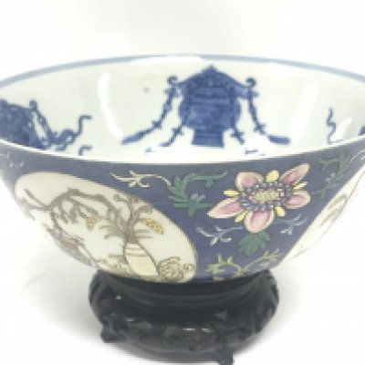 A Chinese Blue Ground Famille Rose bowl ,6cm tall 15cm wide. This lot cannot be posted