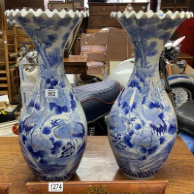 A pair of Japanese fluted blue and white porcelain vases (D)