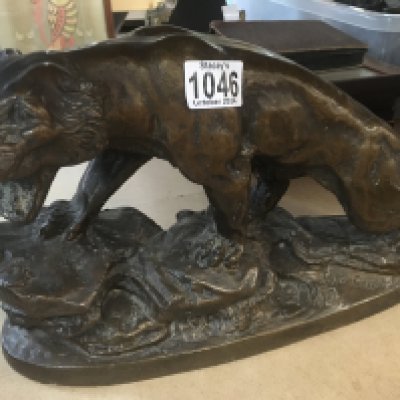 A pottery figure in the form of a tiger. NO RESERVE