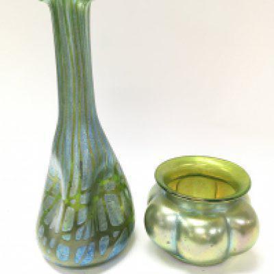 Two Art Nouveau style green and blue coloured glass vases 8 and 25cm tall. Taller glass chipped. This lot cannot be posted