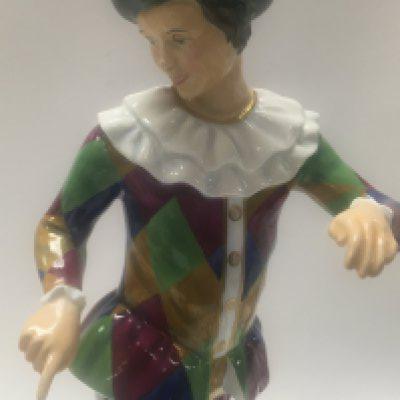 A Royal Doulton figure Harlequin
