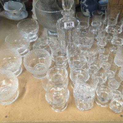 A collection of modern design Iittala drinking glasses and a desert set with bowl.