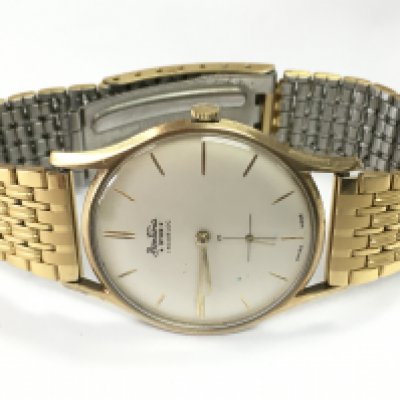 A Gents Bentima Star 9ct gold cased wrist watch . Seen working. Total weight 53g. Postage category A