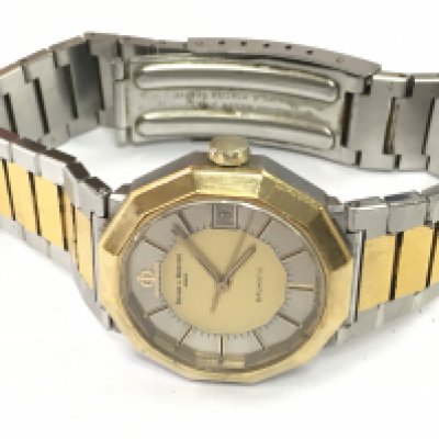 A Baume & Mercier Baumatic wrist watch , serial number 698081 postage category A