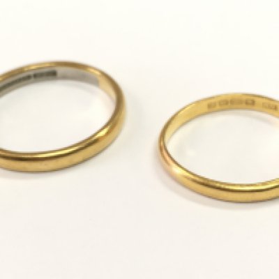 Two 22ct gold wedding band rings, 7.7g total weight. Size Q and T. postage category A