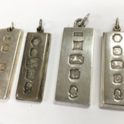 Four solid silver hallmarked ingot pendants , 120g total weight. Postage category A