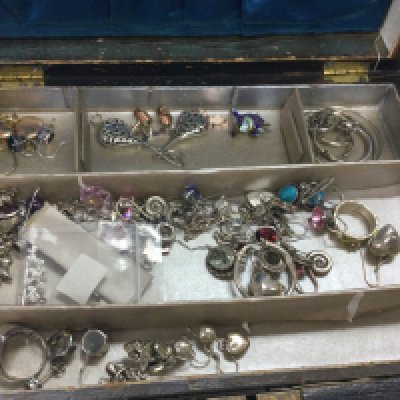 A box of mixed costume jewellery including brooches, necklaces , silver rings , silver earrings , 9ct gold pendants , gold earrings etc