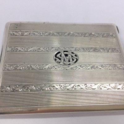 A silver cigarette case, made in Austria marked 935. Postage cat A