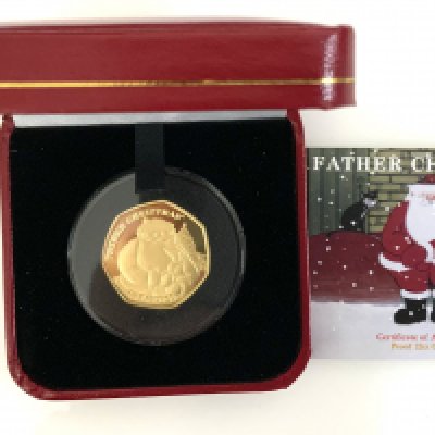 Pobjoy Mint, 2021 issue Father Christmas 22ct gold proof 50p coin. 8g (A)