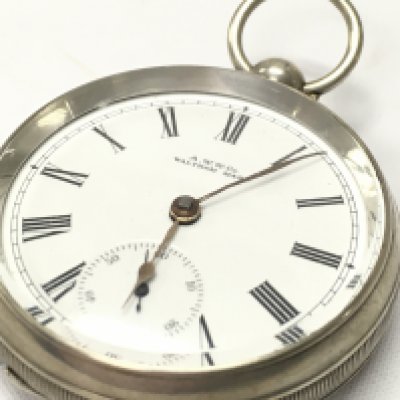 A silver waltham pocket watch, seen working , postage category B