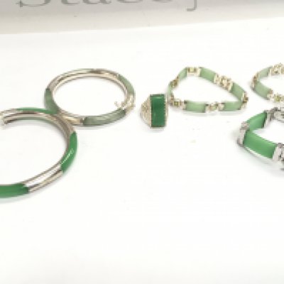 A mixed collection of silver and jade jewellery including bracelets, ring and a watch. Postage category A