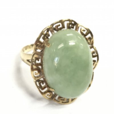 A 9 carat gold jade stone ring , size O. 5g Postage category A