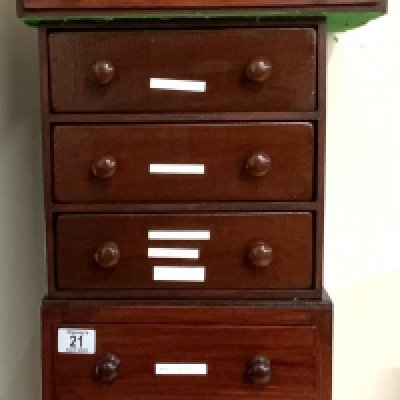 A large collection of British coinage presented in small chests. (4)