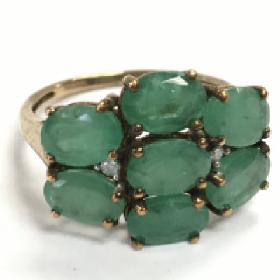 A 9 carat gold emerald cocktail ring , size R/S. 3.6g postage category A
