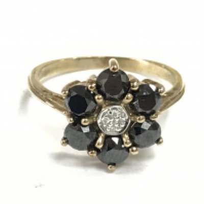 A 9 carat gold sapphire and diamond ring size P/Q. 3.1g Postage category A