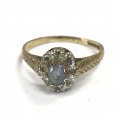 A 9ct gold blue topaz ring, size P. 2g Postage category A