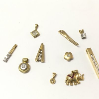 A collection of assorted 18ct gold diamond pendants. 16.93g