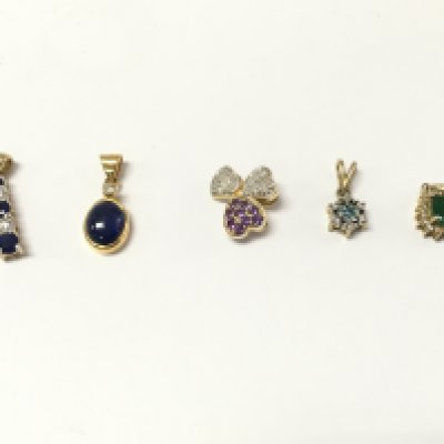 5 14ct gold diamond and mixed stone pendants. 6.63g Postage A