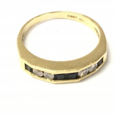 An 18ct gold princess cut sapphire and round cut diamond ring. Size N and 3.55g