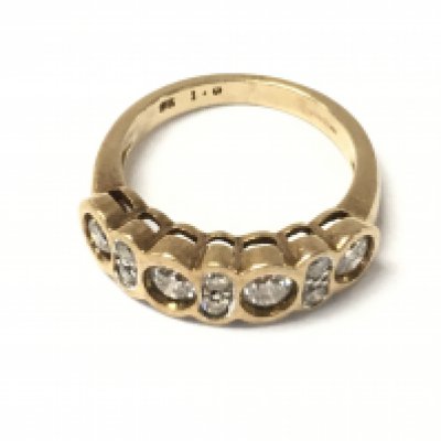 A 9ct gold diamond half hoop ring. Size M and 4.2g