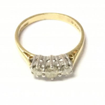 An 18ct 3 stone diamond ring Approx 1/2 ct size L and 2.6g