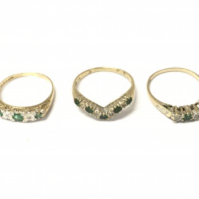 Three 9ct gold emerald and diamond rings. 5.43g Postage A