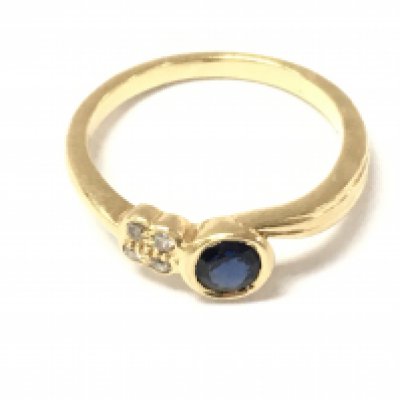 An 18ct gold sapphire and diamond ring. Size N and 3.52g