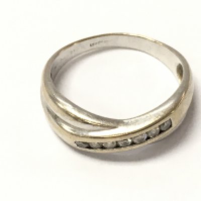 An 18ct white gold diamond crossover ring. Size R 1/2 and 4.5g