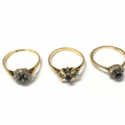 Three 18ct sapphire and diamond cluster rings. 6.80g