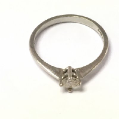 A platinum diamond solitaire ring. 0.33ct size N 1/2 and 2.9g