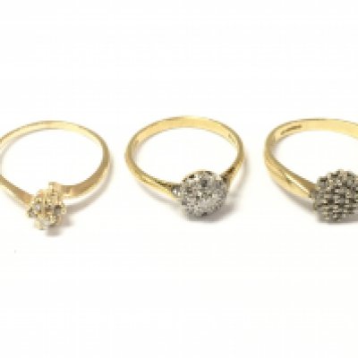 Three 18ct gold diamond cluster rings. 6.82g