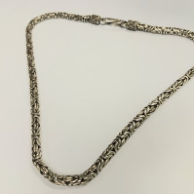 A heavy silver chain , 67g. Postage category A