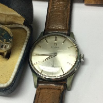 A omega vintage watch together with costume jewellery..