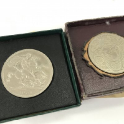 Two 1951 boxed crown coins , postage category A