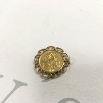 An 1875 sydney mint young head full sovereign in pendant mount. Approx weight 11.16 grams.