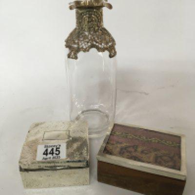 A Quality late 19th century bottle and stopper with applied silver mounts a silver cigarette box and one other hardwood box with a silver rim (3)