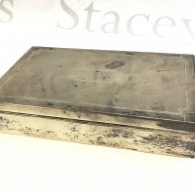 A silver hallmarked cigarette box . Dimensions 11x18x4cm Postage cat B