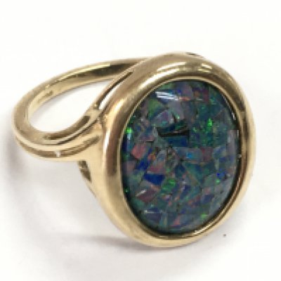 A 9ct gold opal ring, size S. 5.4g total weight. Postage category A